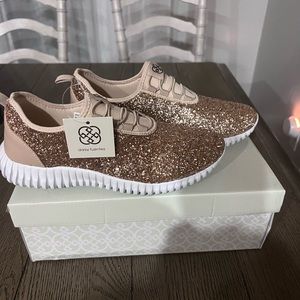 Gold tennis shoe slip on brand new